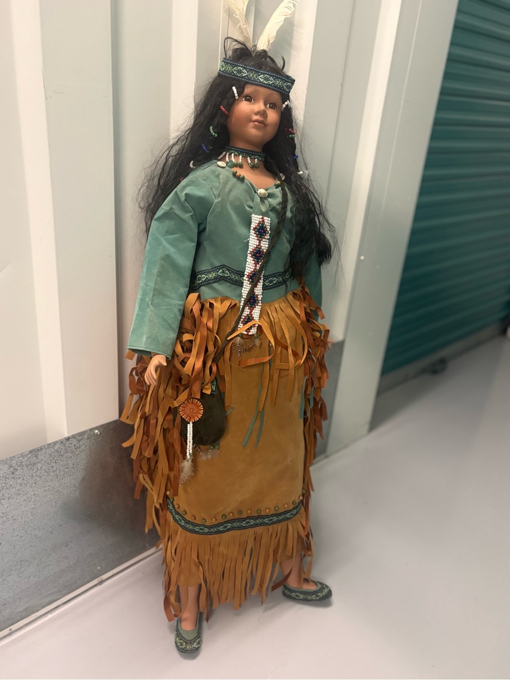 Native Style Collectible Doll with Teal Top and Tan Fringe Skirt - Picture 2 of 16